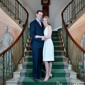 married couple on grand staircase